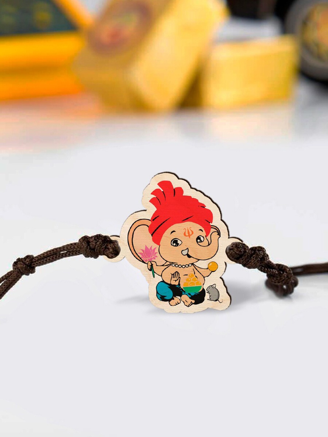 

Bigsmall Boys Red & Blue Ganesha Wooden Rakhi Design