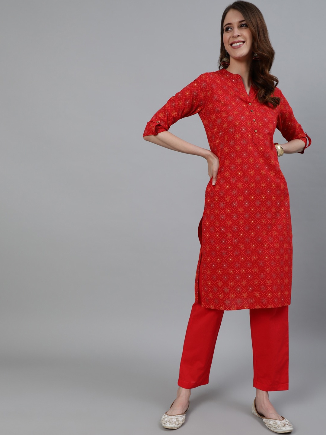 

Ishin Women Red Ethnic Motifs Panelled Pure Cotton Kurti with Trousers