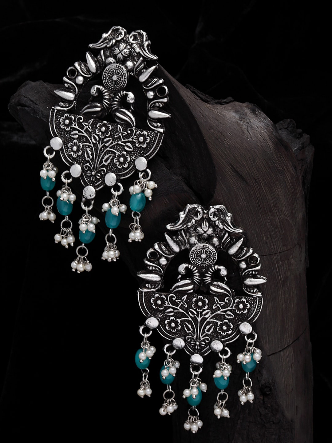 

Moedbuille Silver-Plated & Blue Handcrafted Oxidised Peacock Shaped Drop Earrings