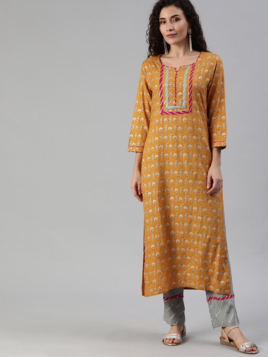 

Ishin Women Mustard Yellow & Grey Floral Printed Kurta with Trousers