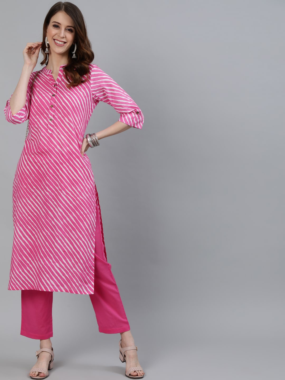 

Ishin Women Pink Striped Pure Cotton Kurta with Trousers