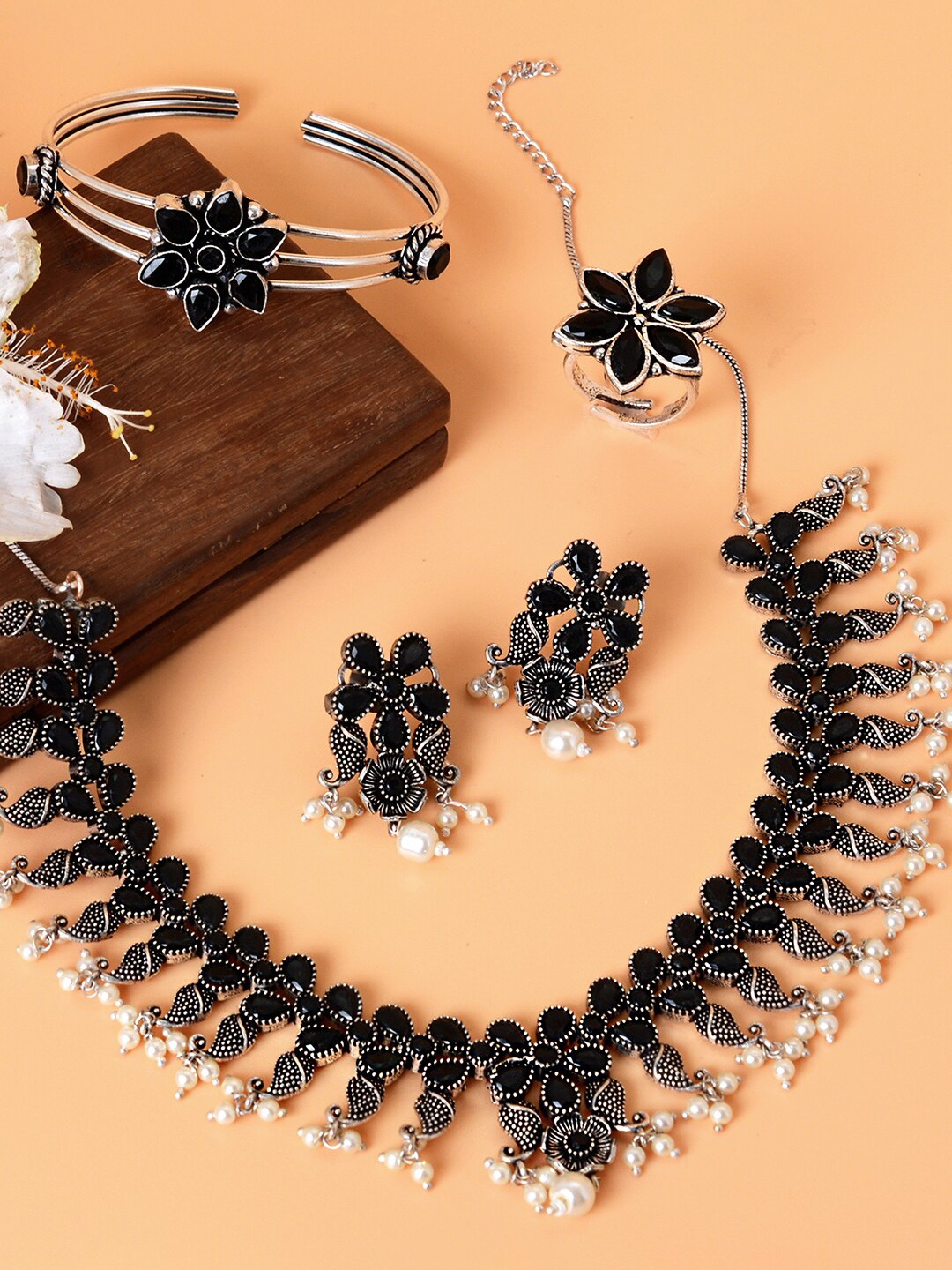 

TEEJH Women Oxidised Silver-Toned Black & White Stone-Studded & Beaded Jewellery Set