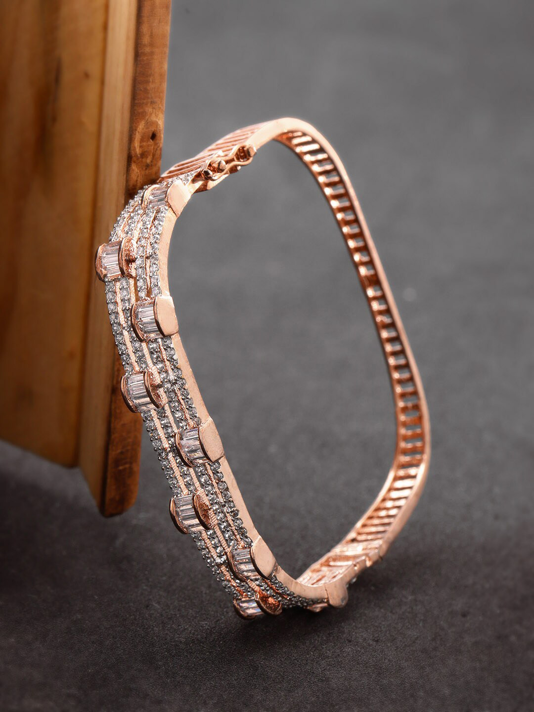 

Priyaasi Women Rose Gold-Plated & White Handcrafted Rose Gold-Plated Bangle-Style Bracelet