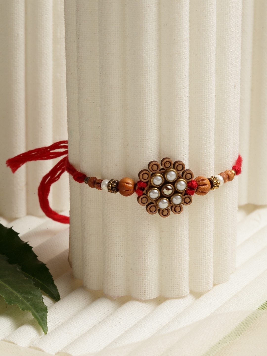 

PANASH Red & Brown Pearl Beads Floral Rakhi With Roli Chawal