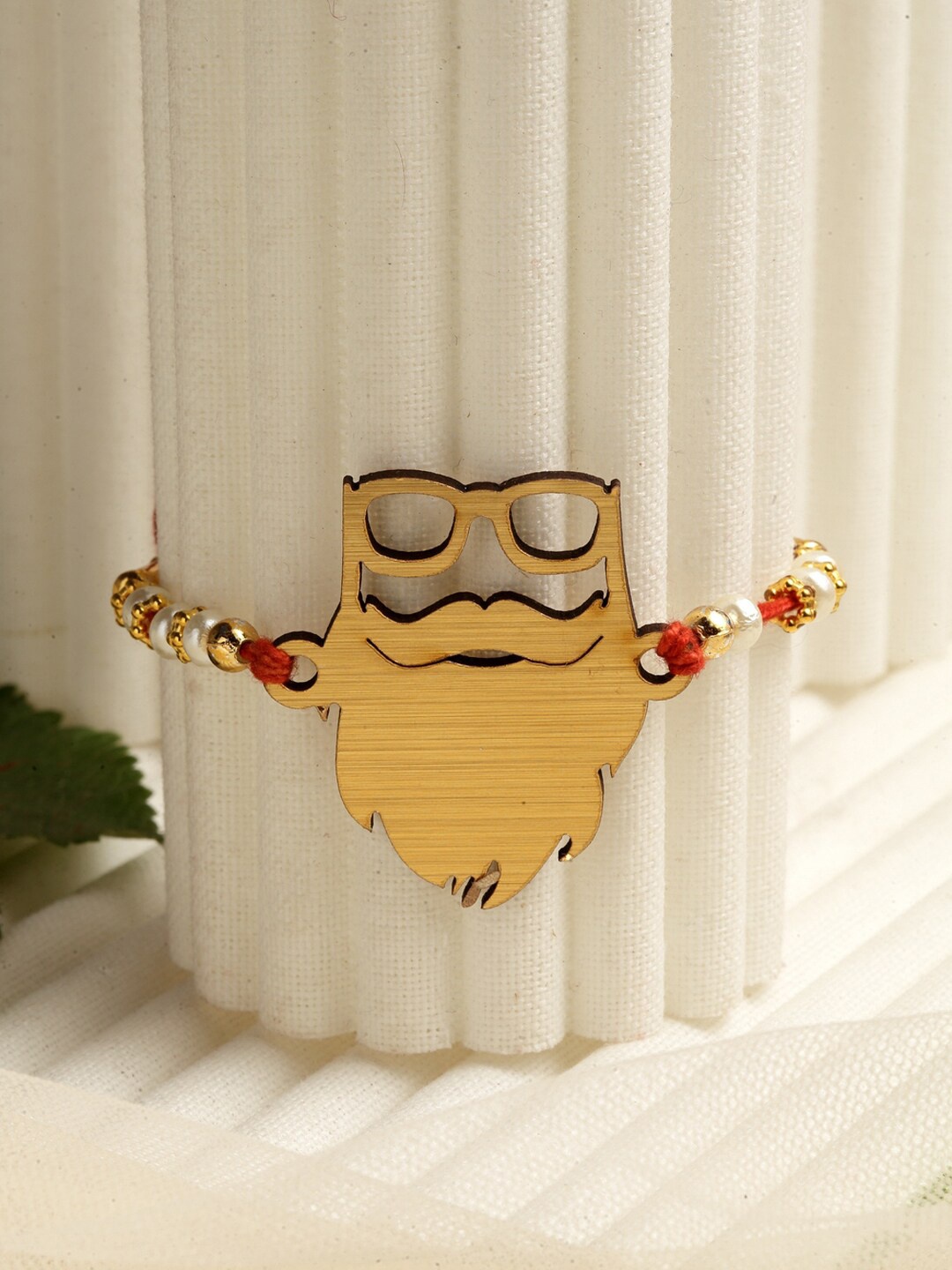 

PANASH Gold-Toned Fancy Rakhi With Roli Chawal
