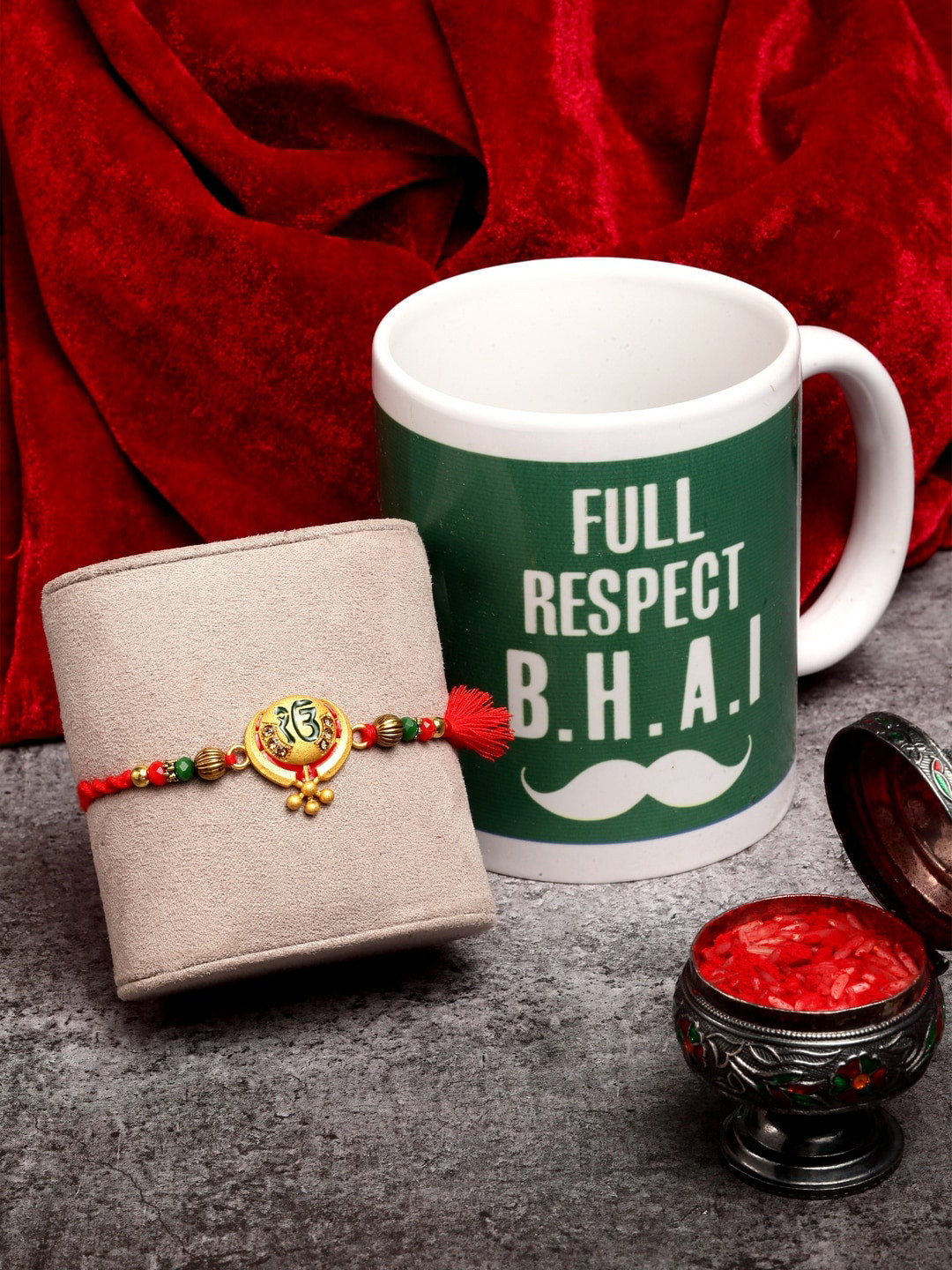 

PANASH Gold-Toned & Red Beaded Khanda Rakhi With Mug & Roli Chawal Gift Set
