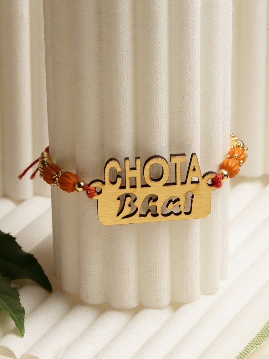

PANASH Gold-Toned Beaded Chota Bhai Rakhi With Roli Chawal
