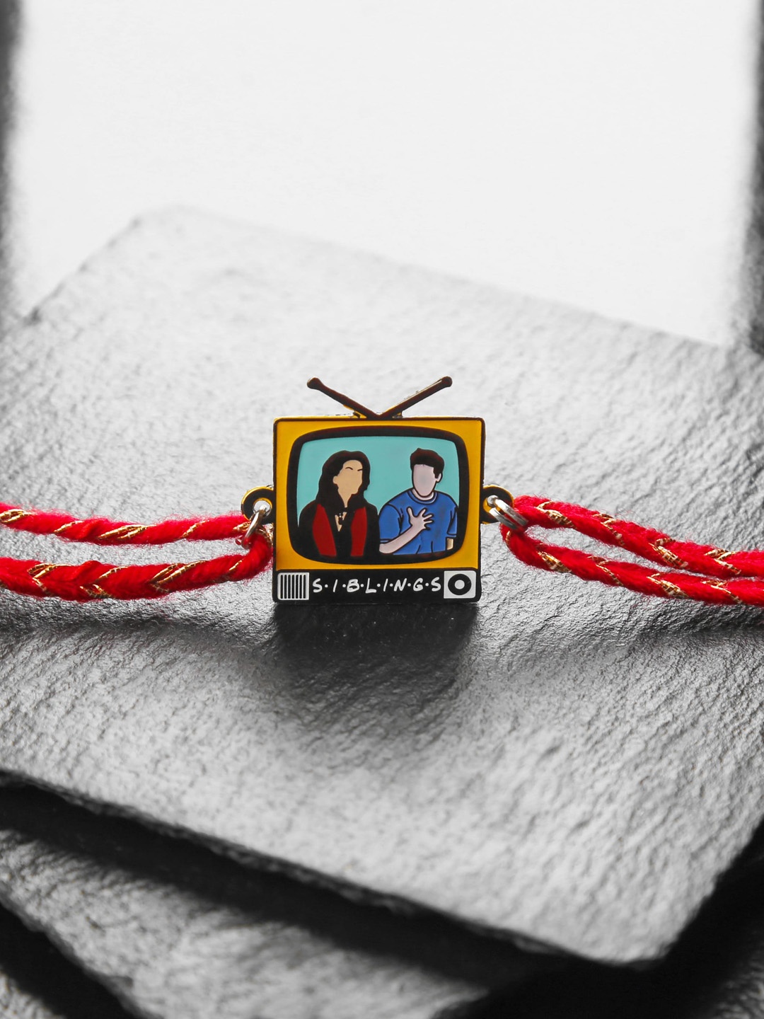 

Bigsmall Men Orange & Black Friends TV Themed Rakhi