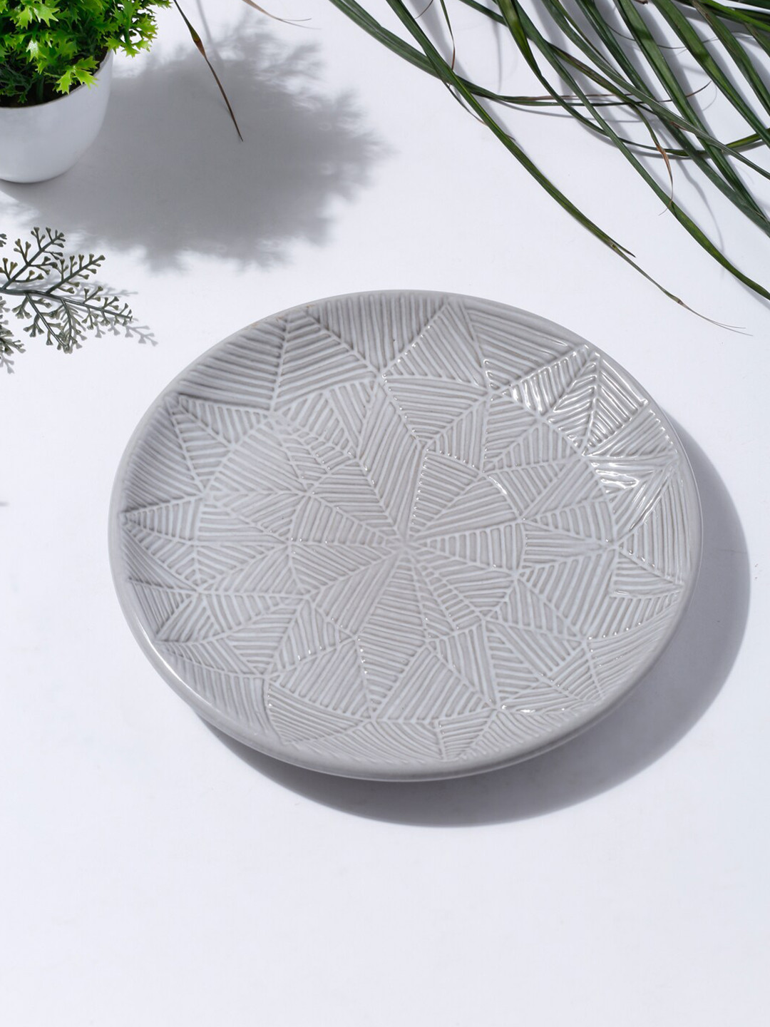 

Fabindia Grey 1 Piece Ceramic Udyati Engraved Quarter Plate