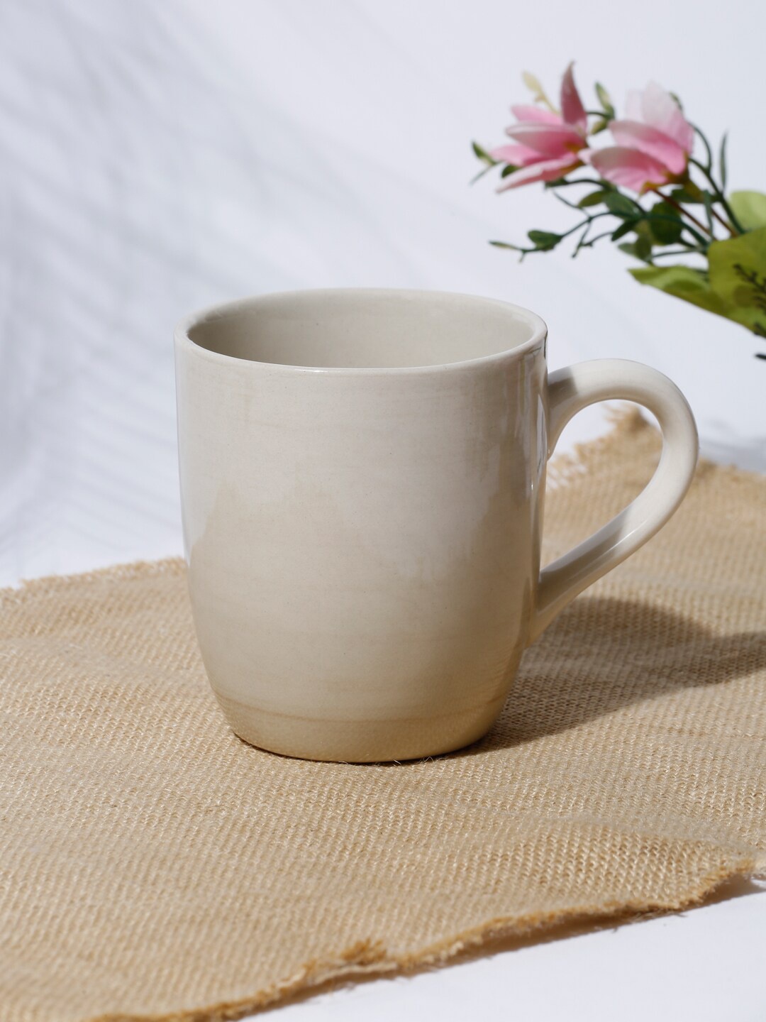 

Fabindia Off-White Ceramic Sikata Handpainted Cup 400ml