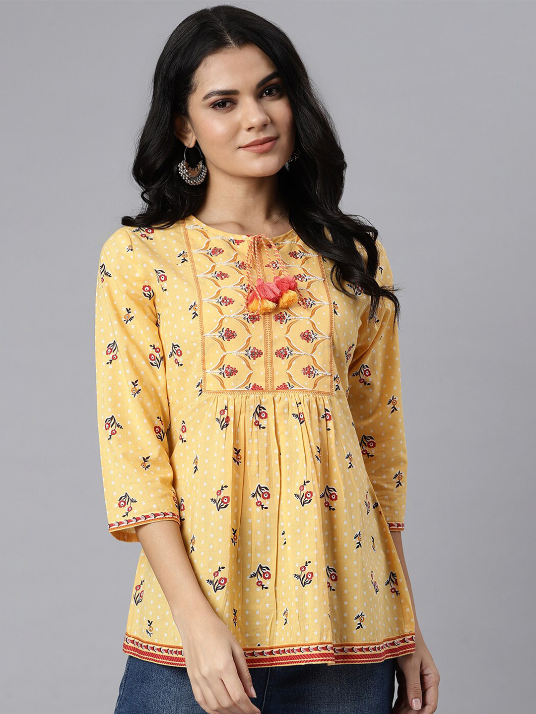

QOMN Yellow Ethnic Print Tie-up Neck Top