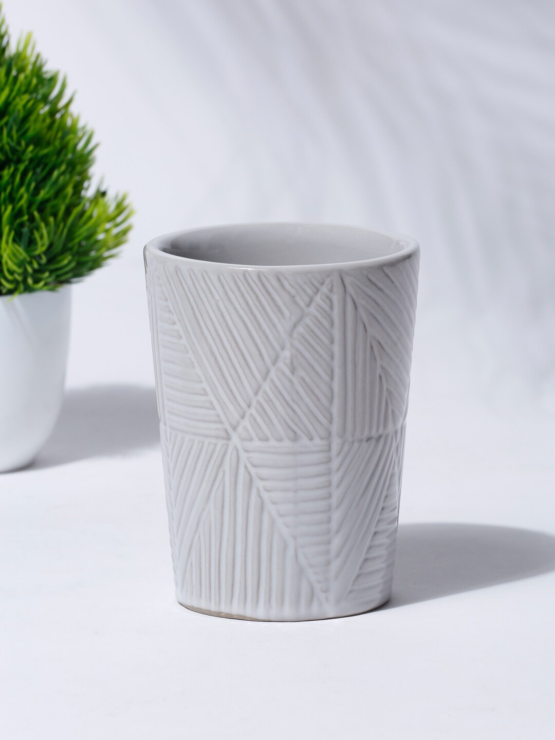 

Fabindia Grey Textured Ceramic Udyati Engraved Tumbler 250 ML