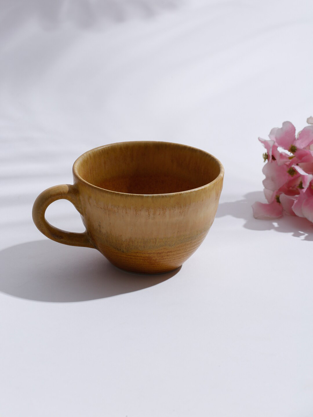 

Fabindia Brown Glazed Ceramic Glossy Cup