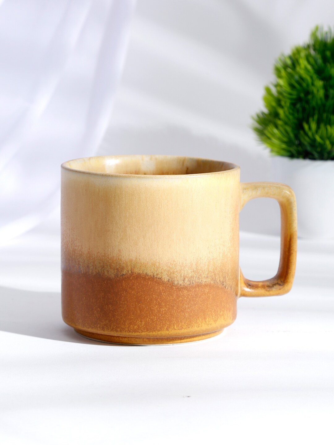 

Fabindia Brown & Beige Solid Ceramic Jaksh Glazed Cup