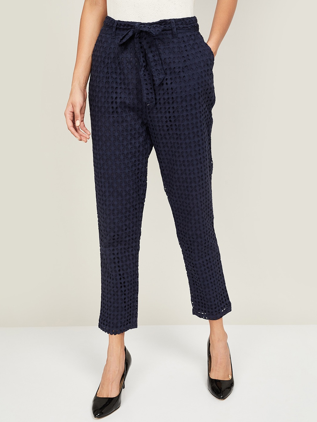 

Bossini Women Navy Blue Printed Pleated Peg Trousers