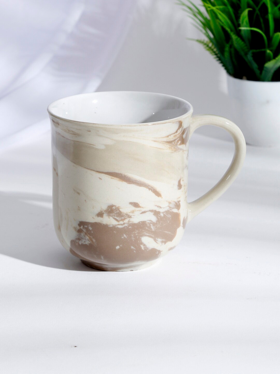 

Fabindia Off-White & Brown Ceramic Reyansh Glazed Cup 360ml