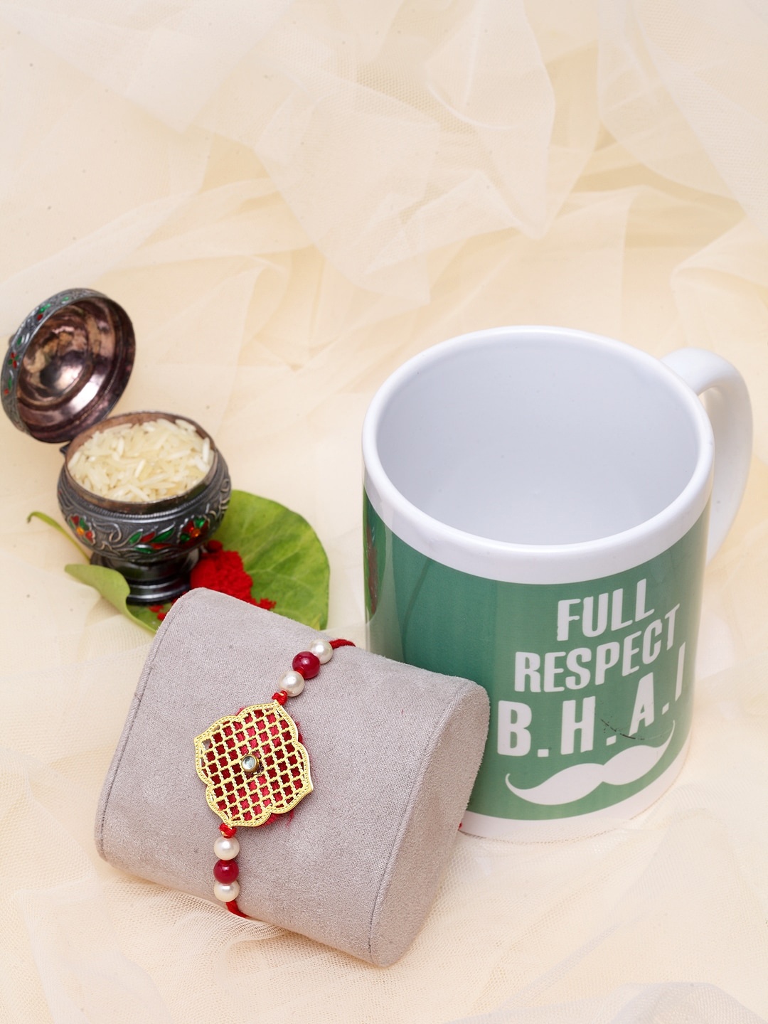 

PANASH Men Gold-Plated Handcrafted Rakhi With Mug & Roli Chawal