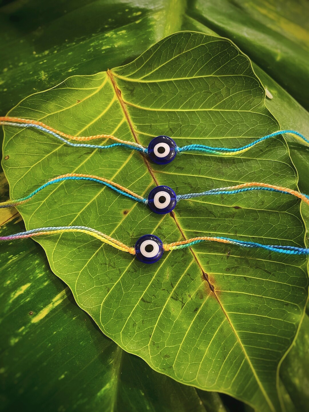 

Digital Dress Room Blue Set of 3 Evil Eye Rakhis with Flower Turkish Charm
