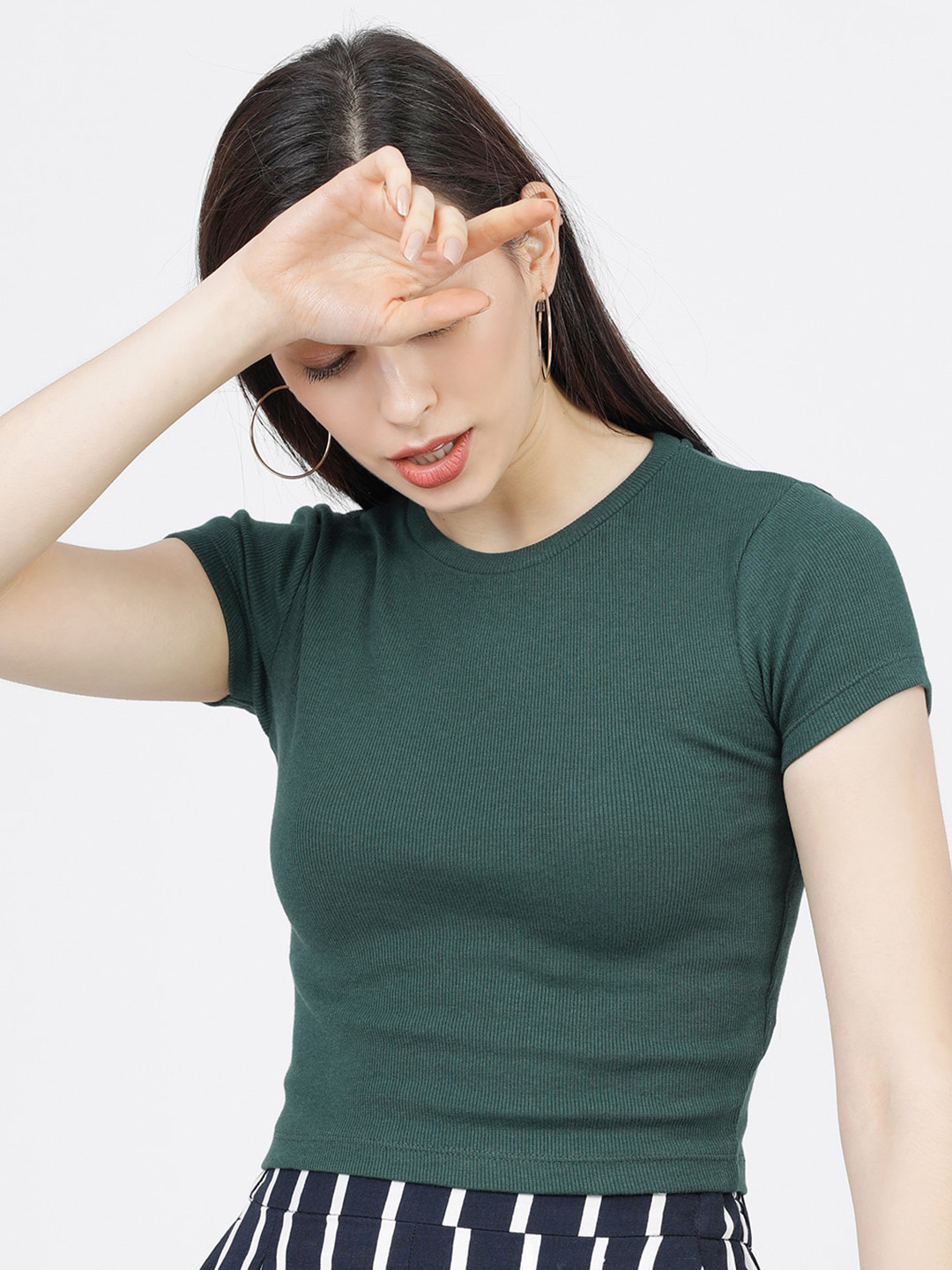 

Tokyo Talkies Women Solid Green Regular Top