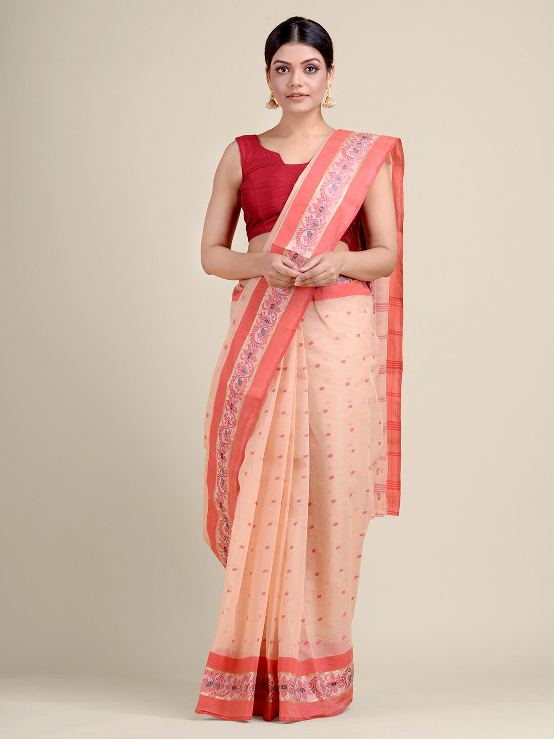 

Charukriti Beige & Peach Coloured Ethnic Motifs Hand Woven Design Pure Cotton Taant Saree