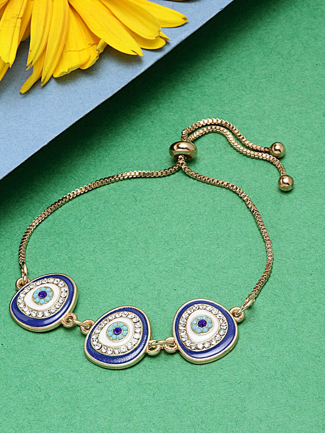 

Ferosh Women Gold-Toned & Blue Charm Bracelet