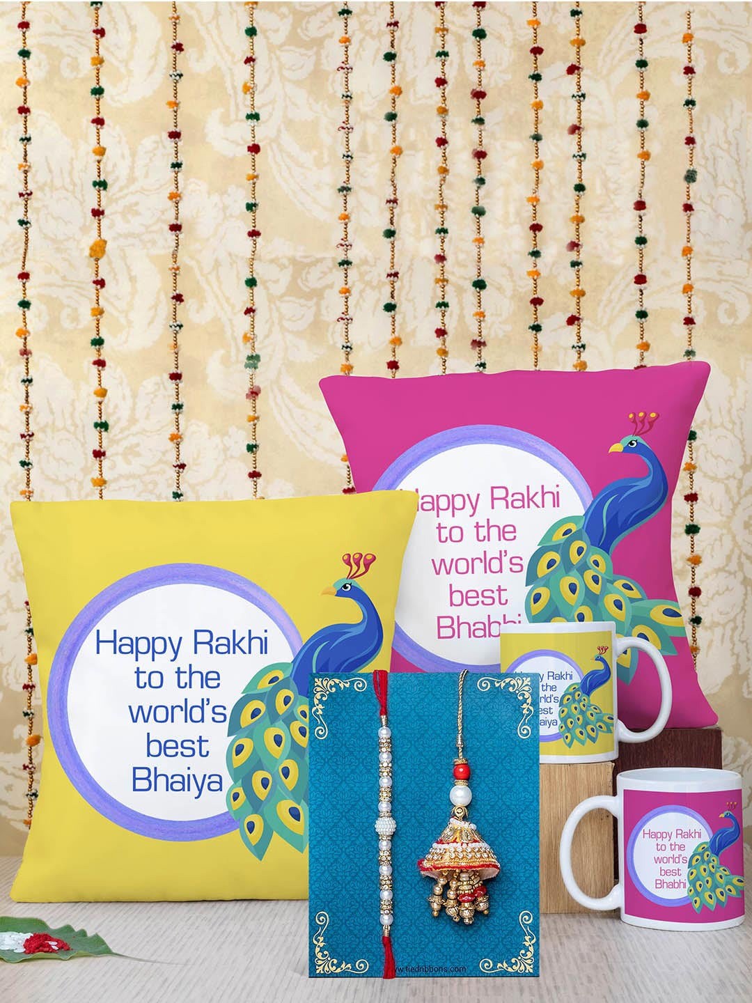 

TIED RIBBONS Set of 2 Bhaiya Bhabhi Rakhi with Cushion & Mug Combo Gift Pack, Multi