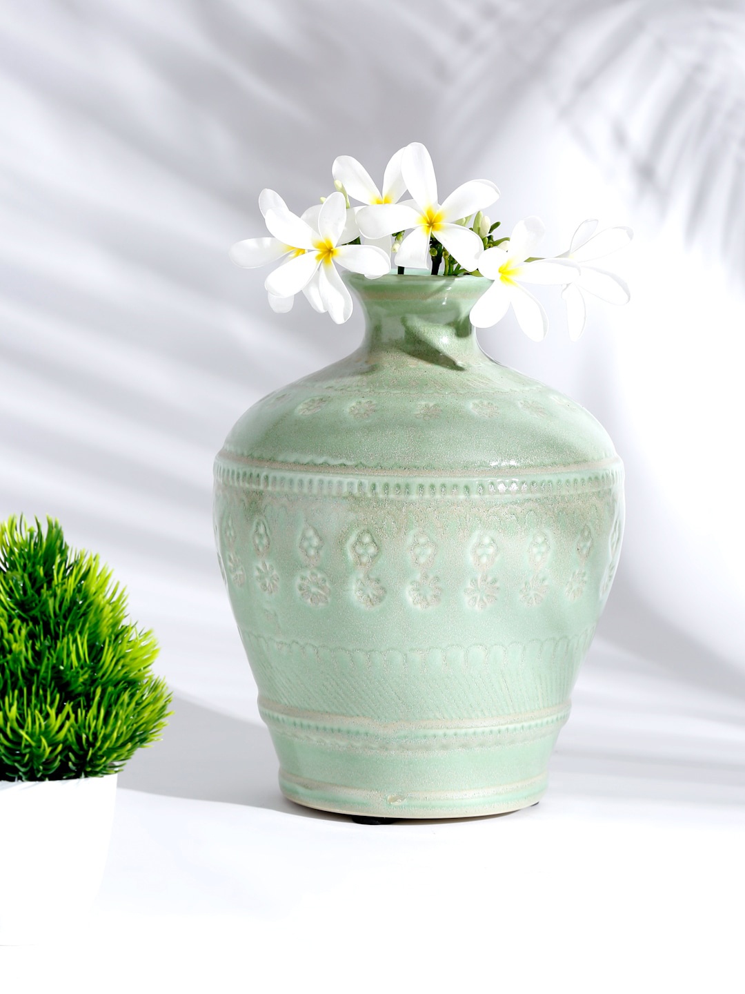 

Fabindia Green Textured Ceramic Haritaha Glazed Vase