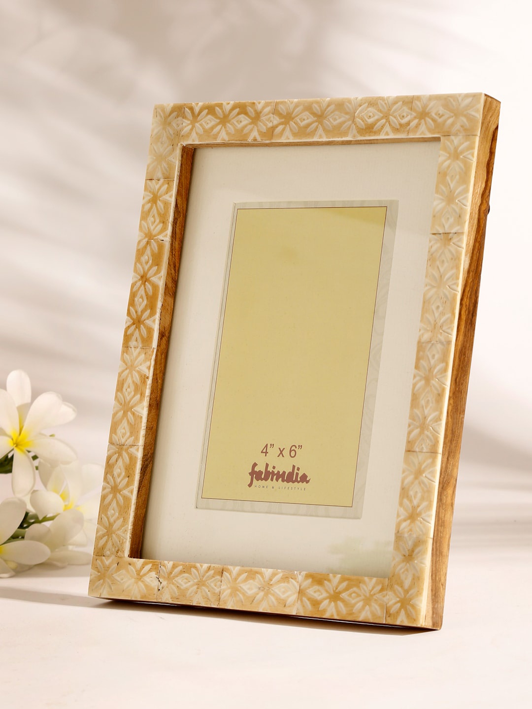 

Fabindia Beige & White Bone Ajmal Cutwork Wooden Table Photo Frame