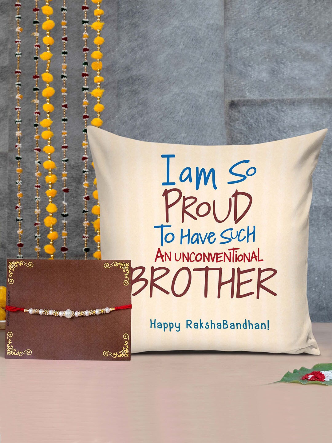 

TIED RIBBONS Pearl Rakhi with Printed Cushion Gift set, Cream