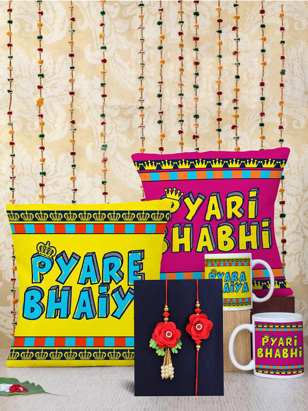 

TIED RIBBONS Muticoloured 5 Pcs Bhaiya Bhabhi Rakhi with Printed Cushion Mug Gift Pack, Multi