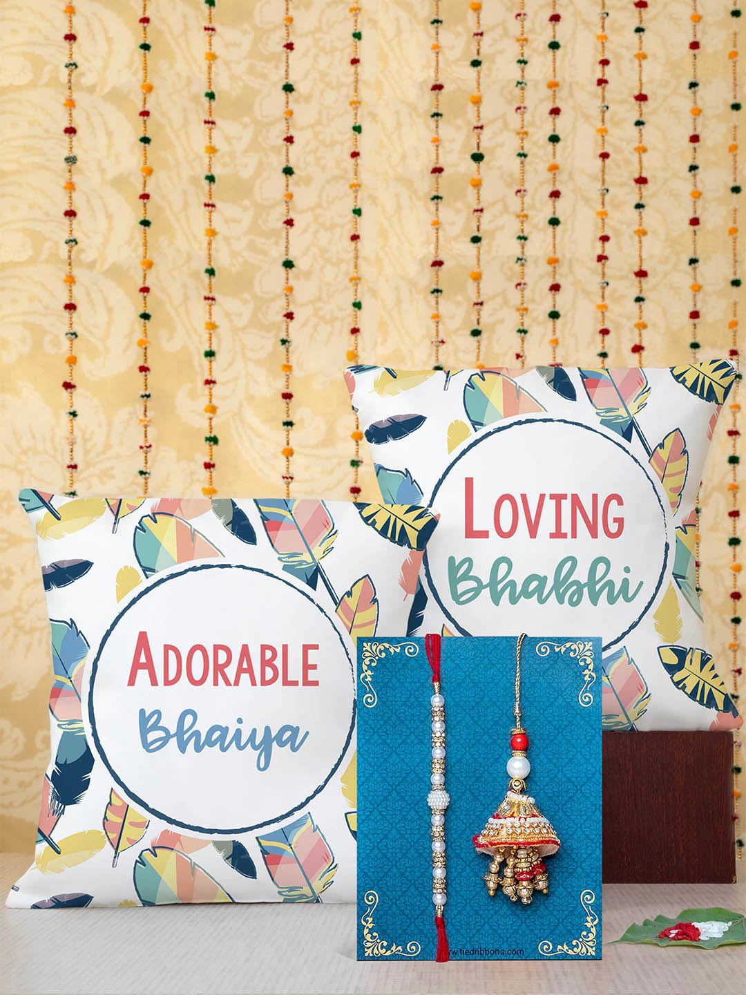 

TIED RIBBONS Unisex Red & White Bhaiya Bhabhi Lumba Rakhi with Printed Cushion Gift Set