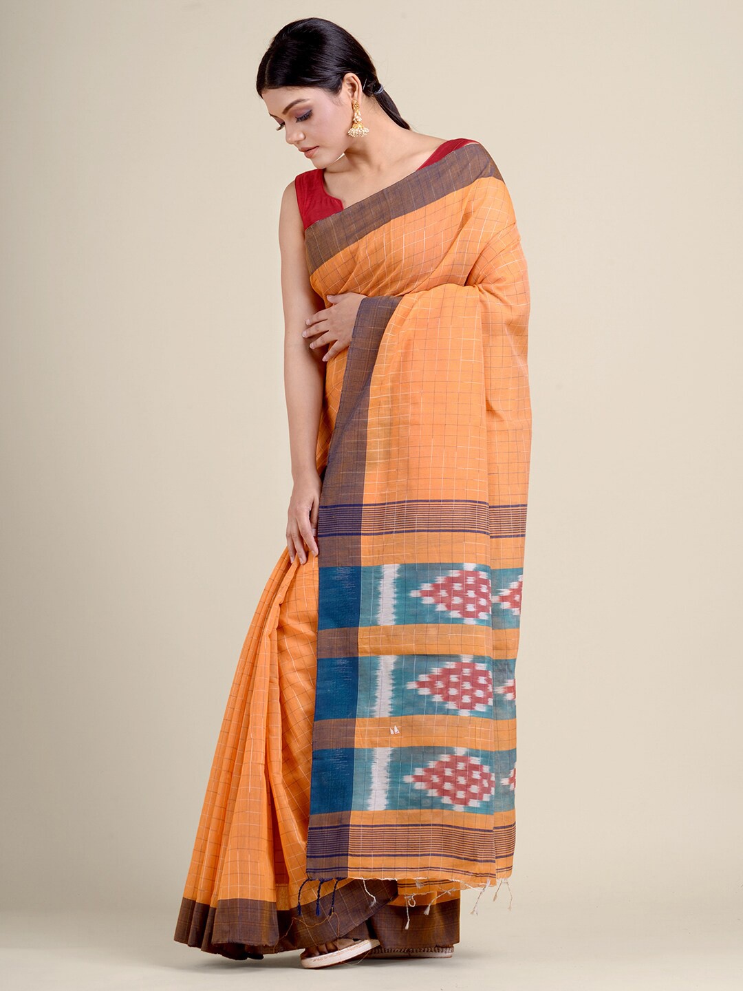 

Charukriti Orange & Green Handloom Cotton Blend Saree