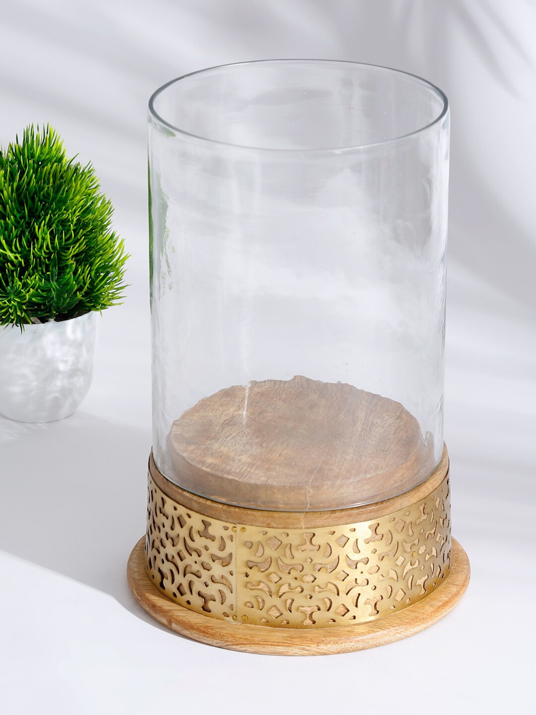 

Fabindia Gold-Toned & Transparent Textured Pillar Candle Holder
