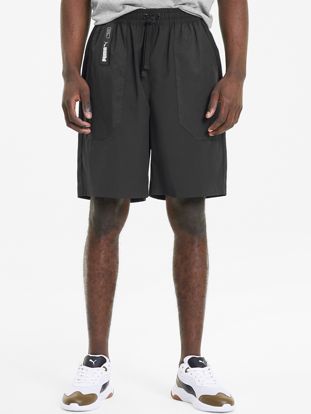 

Puma Men Black Printed Mid-Rise Outdoor Sports Shorts