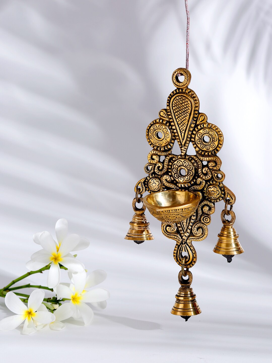 

Fabindia Gold-Toned Brass Mehnoor Casted Wall Oil Lamp