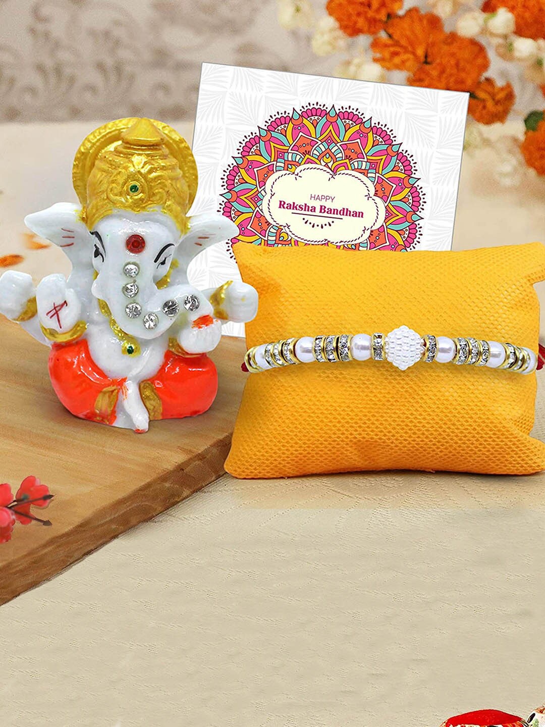 

TIED RIBBONS Multicolored Rakhi with Mini Ganesha Idol & Card, Multi