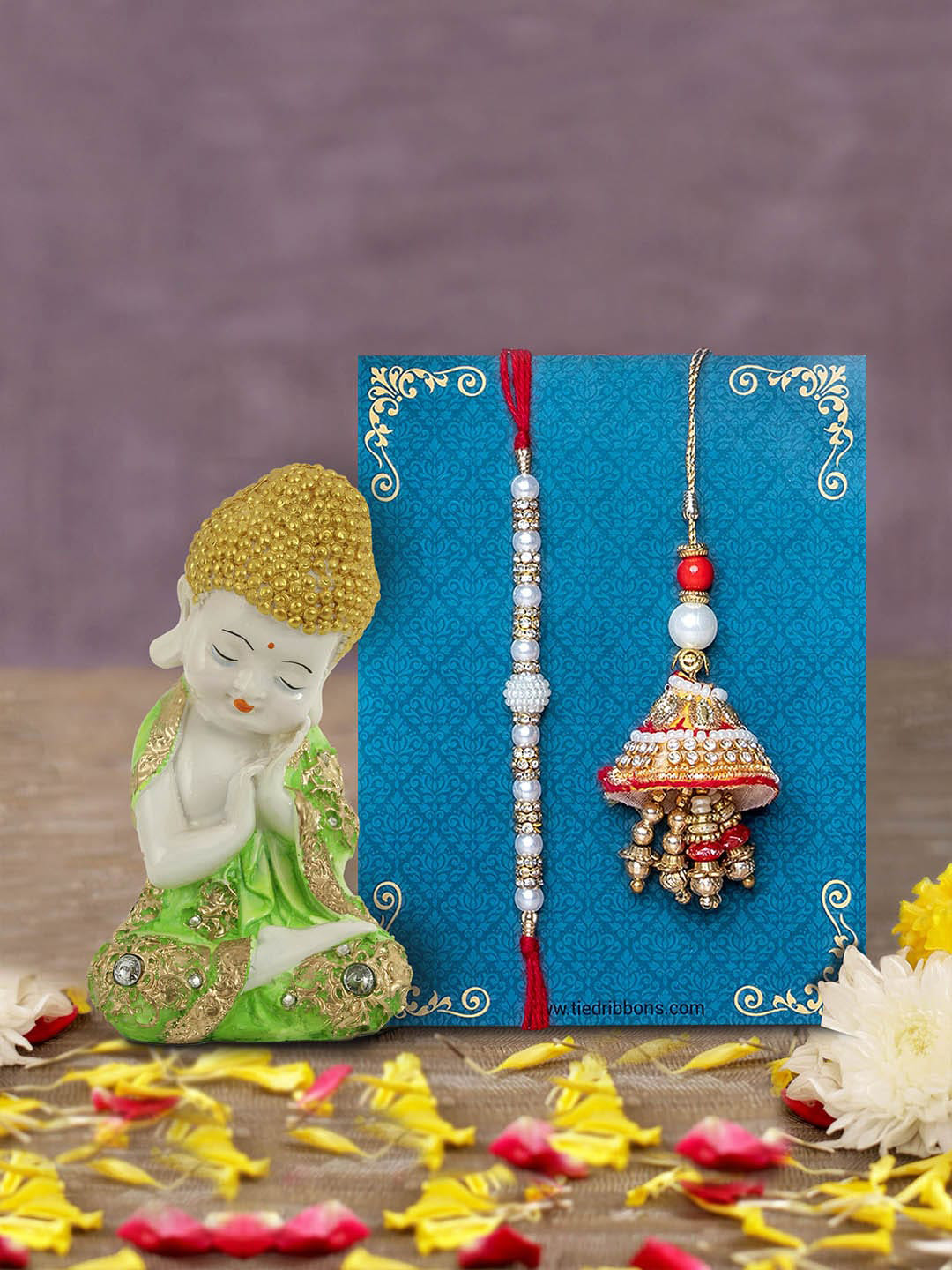 

TIED RIBBONS Multicolored Handcrafted Bhaiya Bhabhi Lumba Rakhi & Buddha Idol Gift Pack, Multi