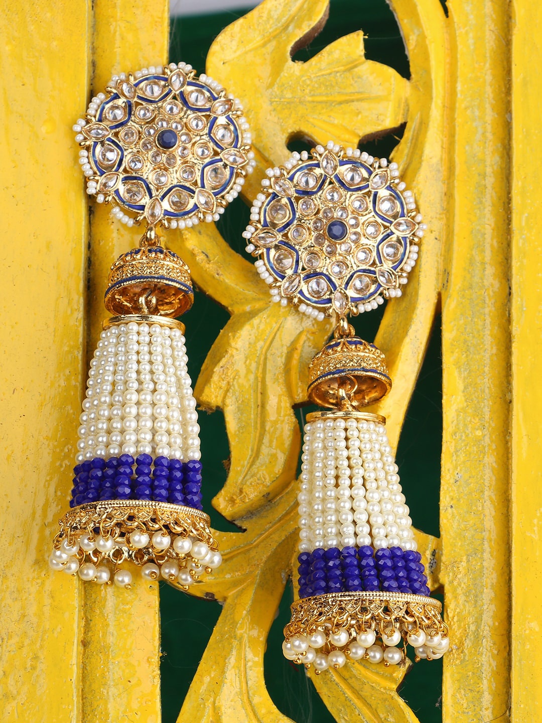 

ANIKAS CREATION Gold-Toned & Blue Tasselled Contemporary Jhumkas Earrings