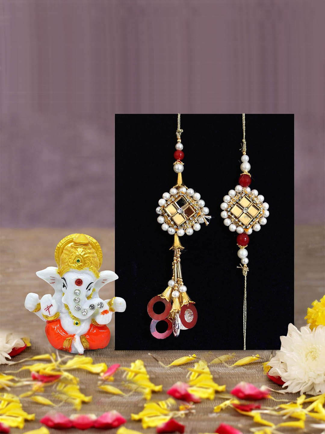 

TIED RIBBONS White & Gold-Toned Bhaiya Bhabhi Lumba Rakhi with Ganesha Idol Combo Gift Set