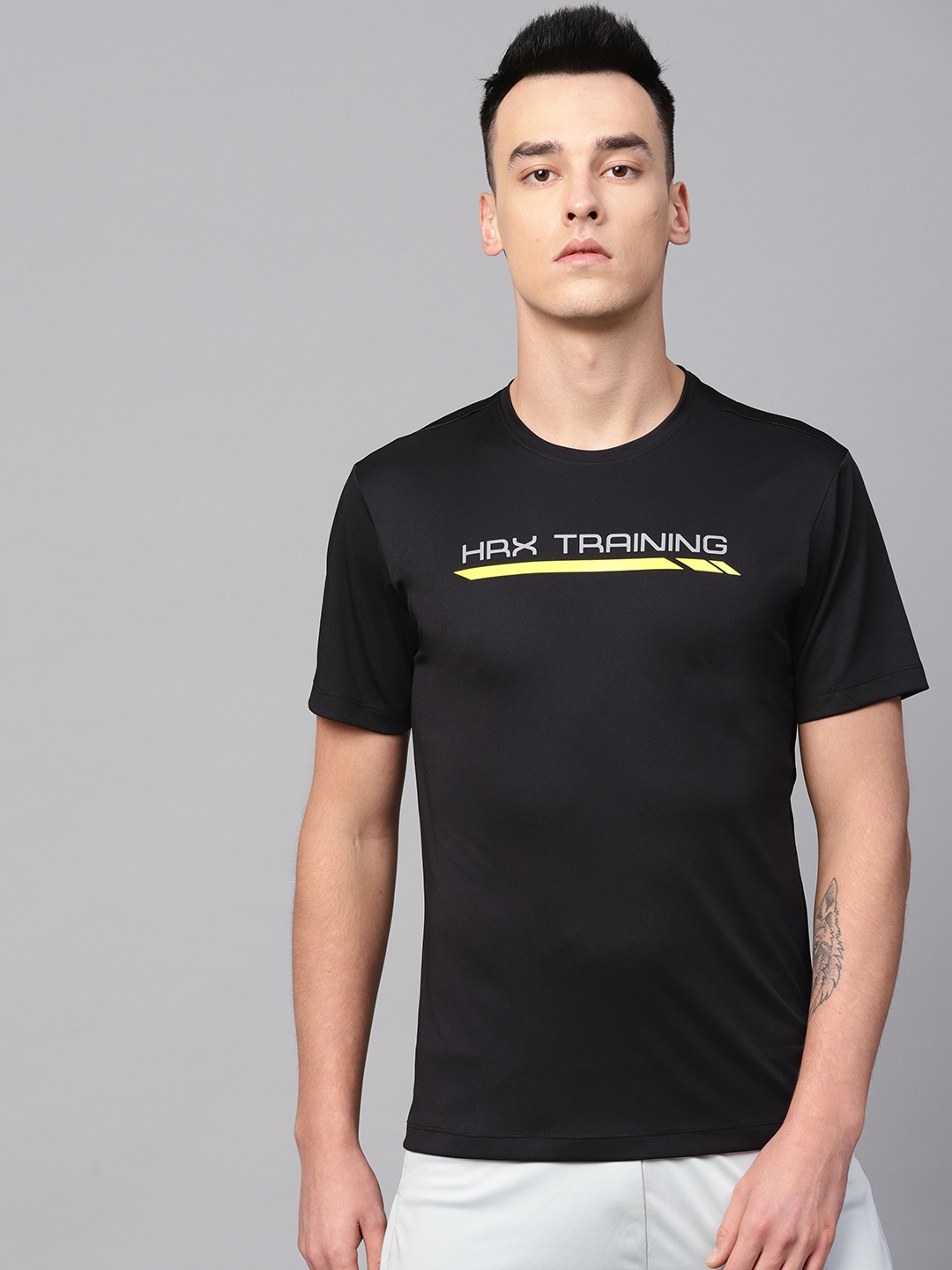 Buy HRX By Hrithik Roshan Men Black Solid Training T Shirt - Tshirts ...