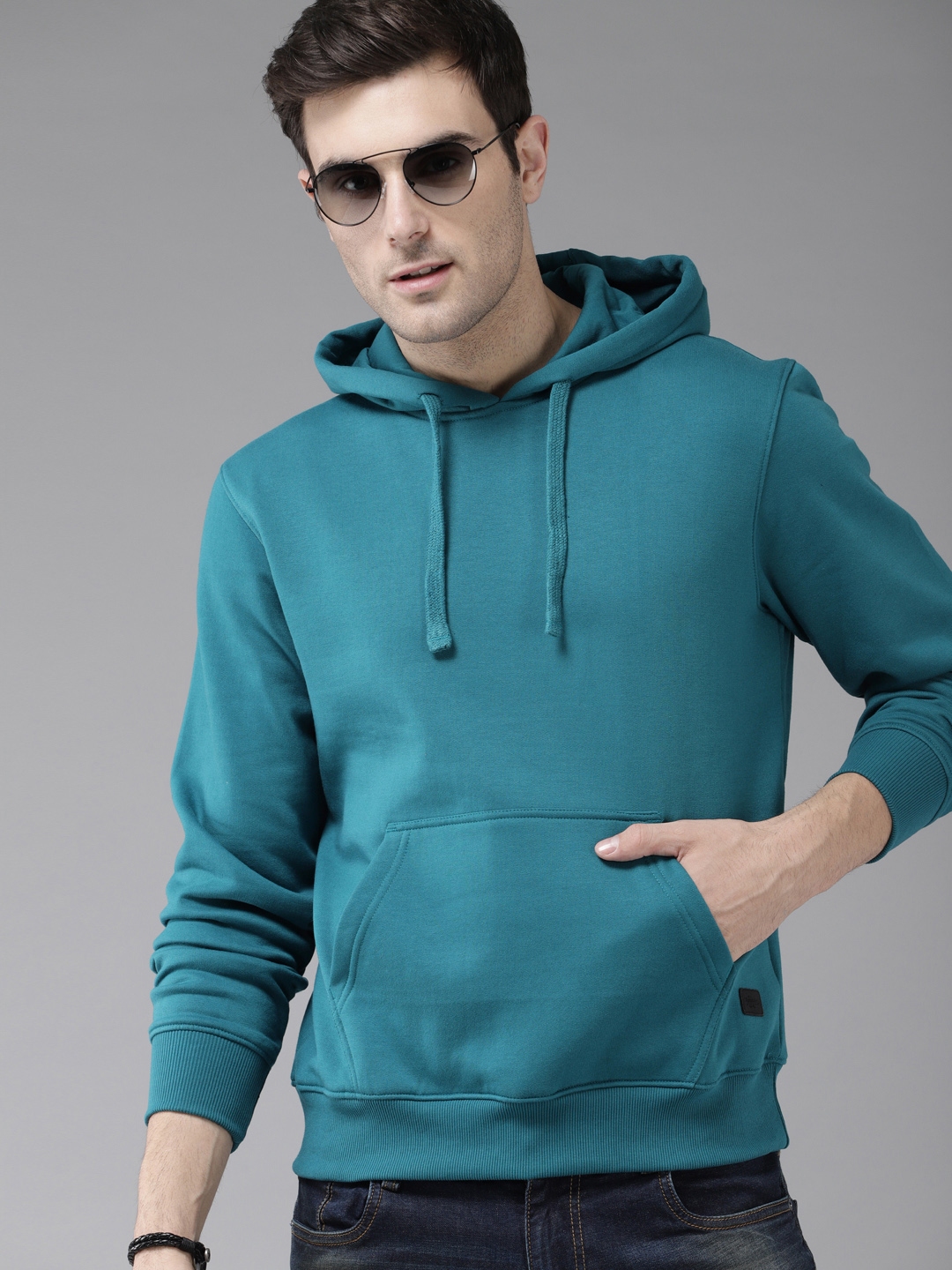 Buy The Roadster Lifestyle Co Men Teal Blue Solid Hooded Sweatshirt ...