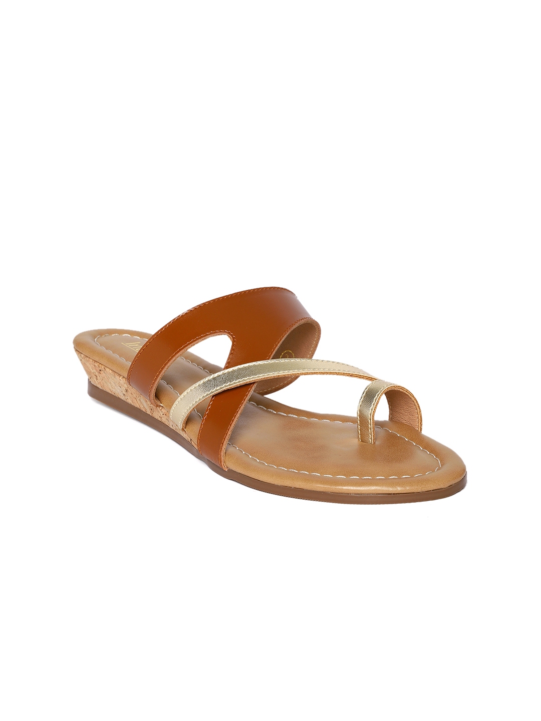 tan flats with black toe