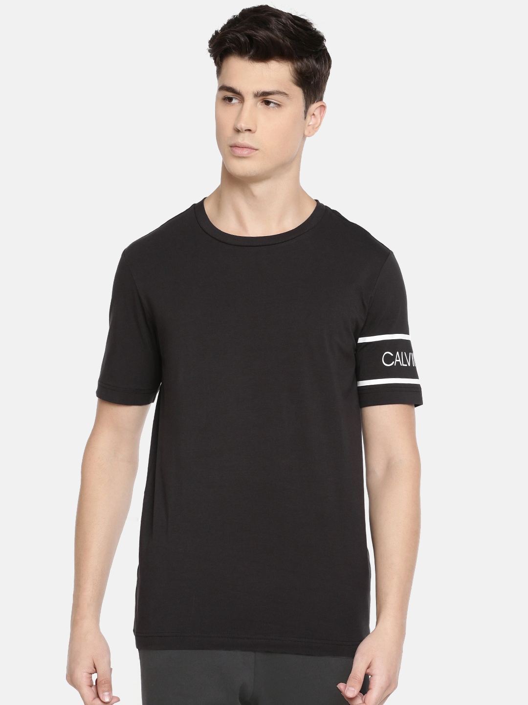Buy Calvin Klein Jeans Men Black Solid Active Round Neck T Shirt ...