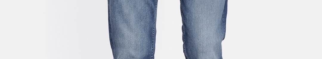 Buy Lee Men Blue Travis Slim Fit Mid Rise Clean Look Stretchable Jeans ...