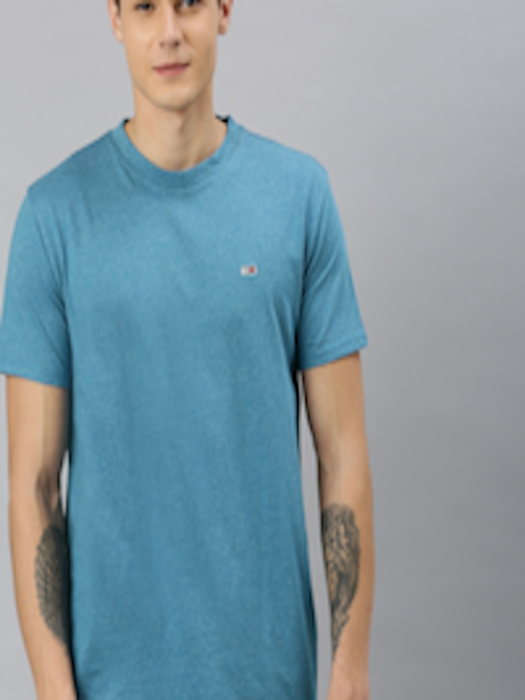 Buy Tommy Hilfiger Men Blue Solid Round Neck T Shirt - Tshirts for Men ...