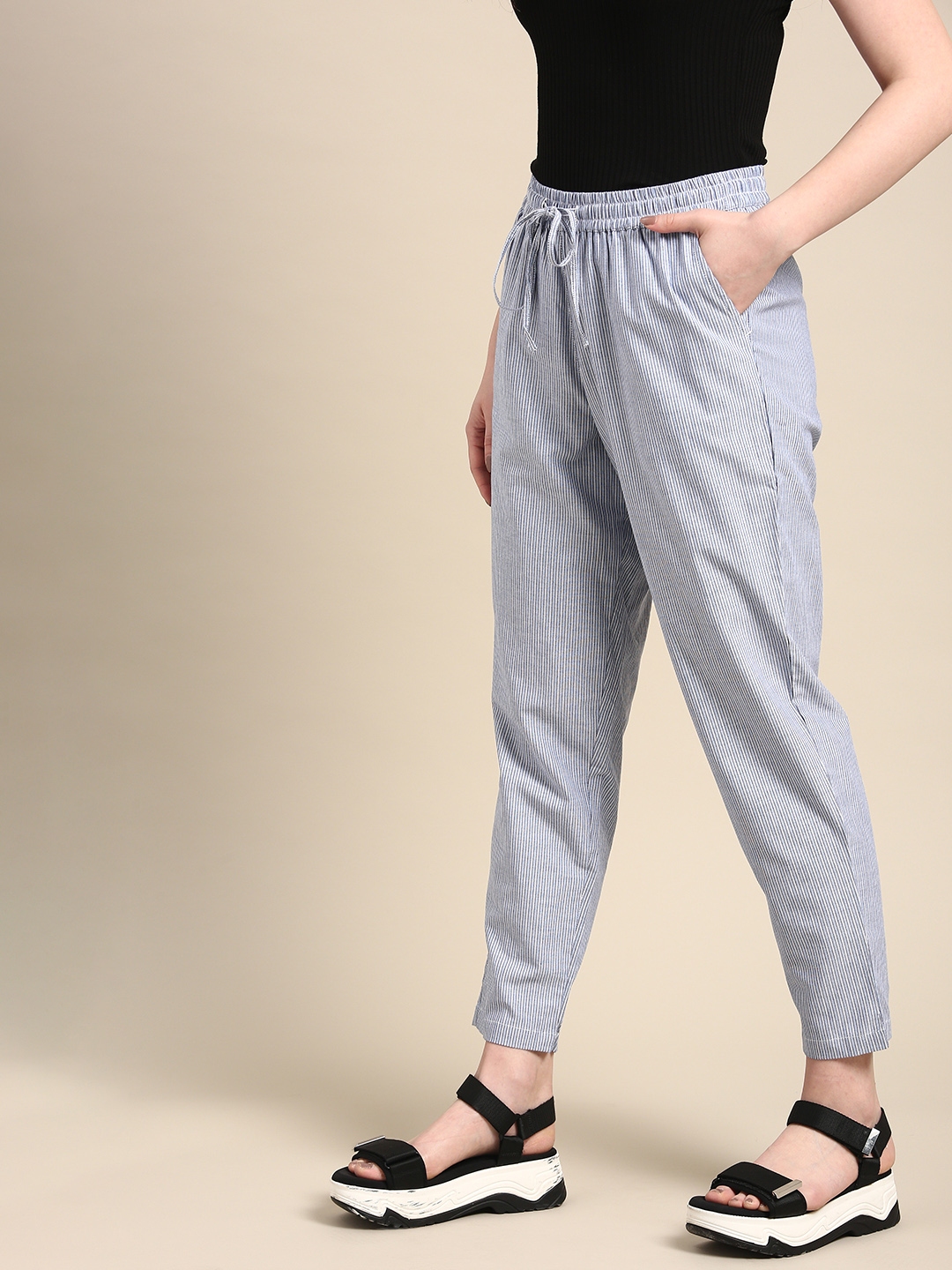 striped tapered trousers