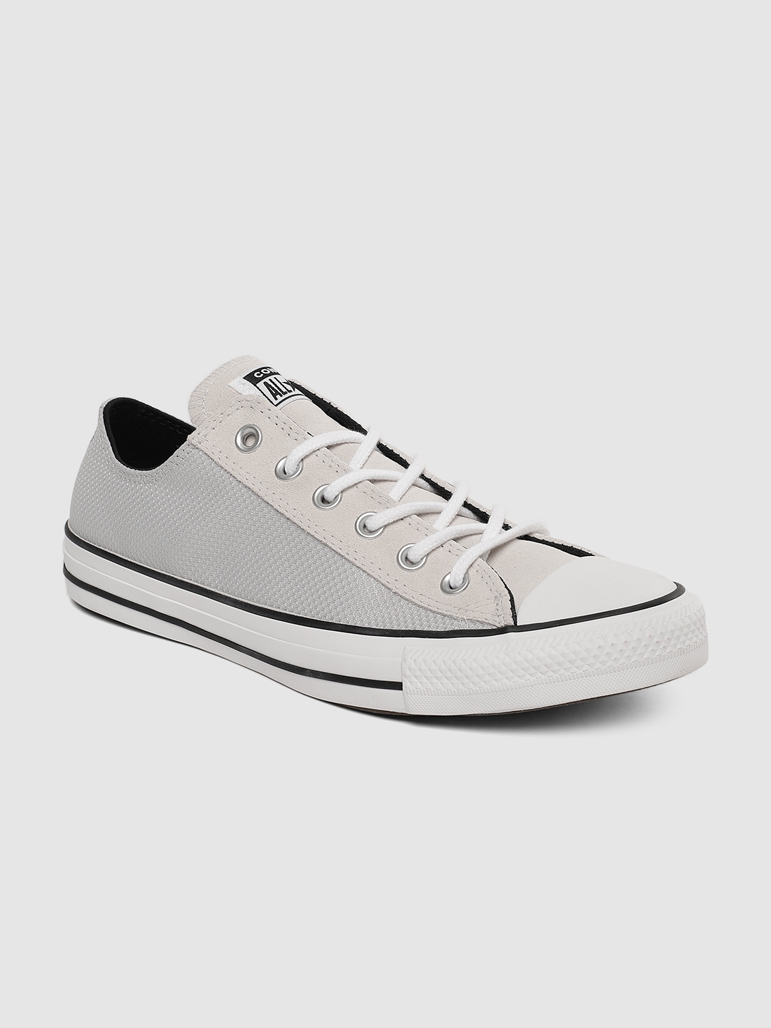ucb white sneakers myntra