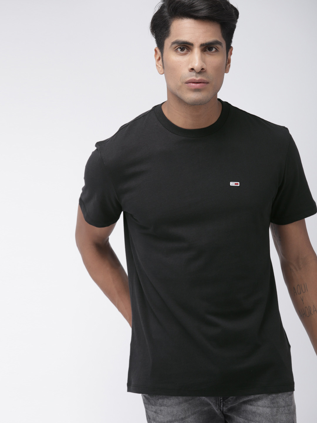 Buy Tommy Hilfiger Men Black Solid Round Neck Pure Cotton T Shirt