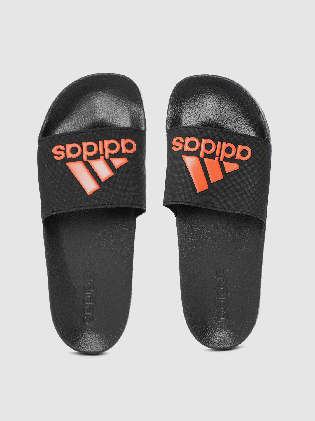 Buy ADIDAS Men Black & Red Emboss Print Sliders - Flip Flops for Men 10393845 | Myntra