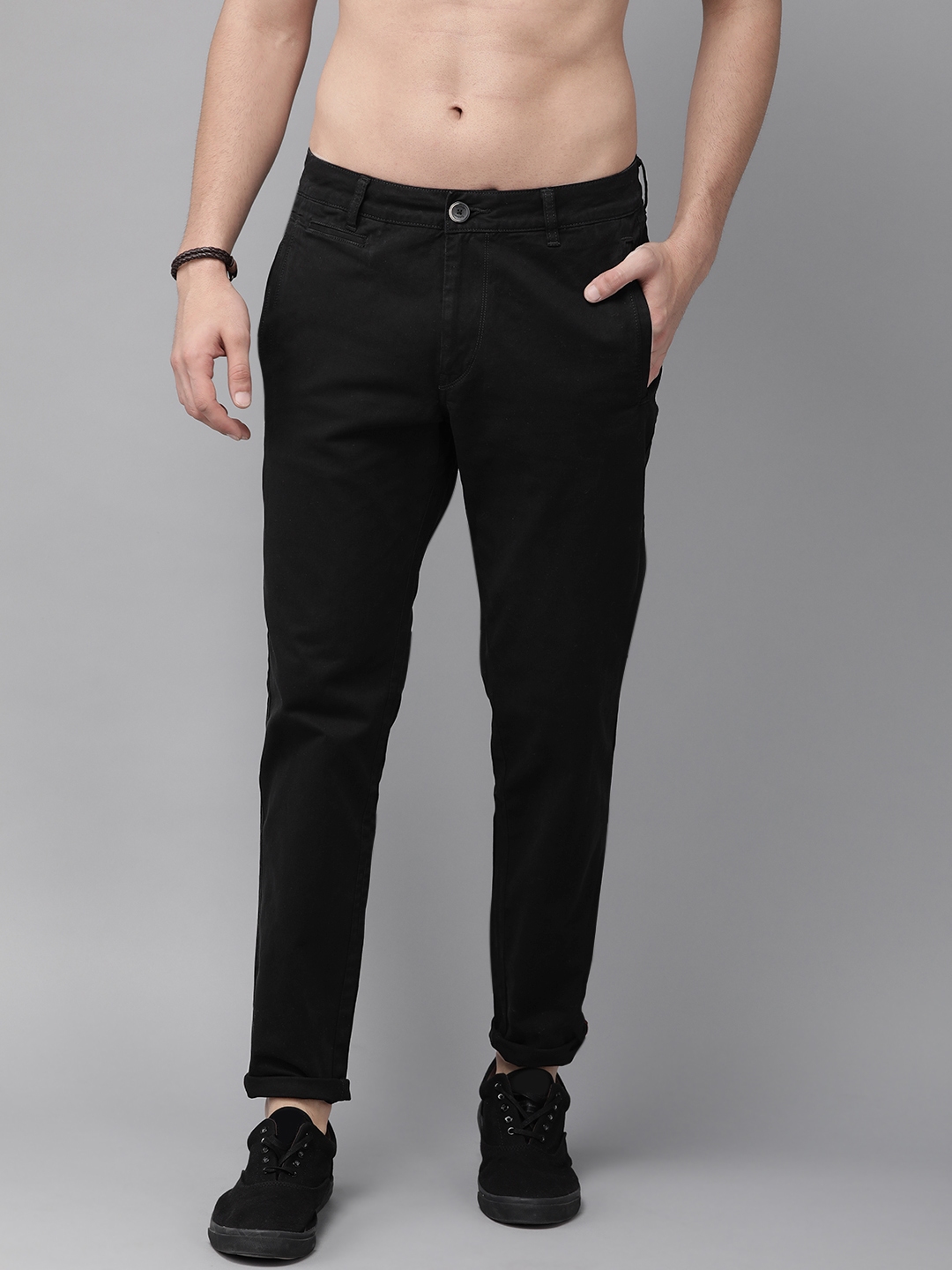Buy The Roadster Lifestyle Co Men Black Solid Chinos - Trousers for Men ...